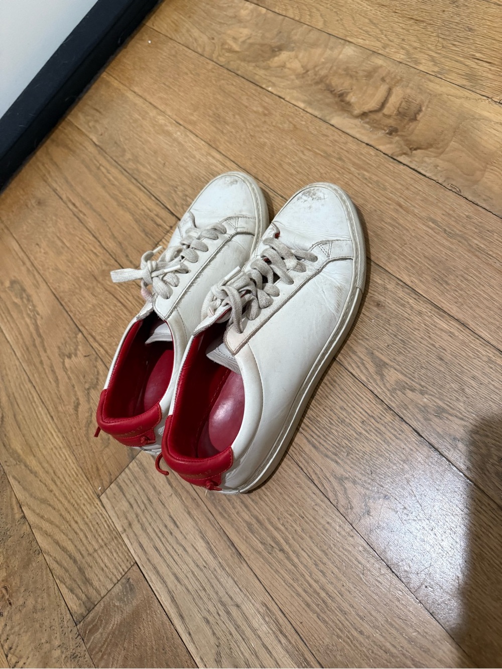 Women’s white and red Givenchy Urban Knot sneakers